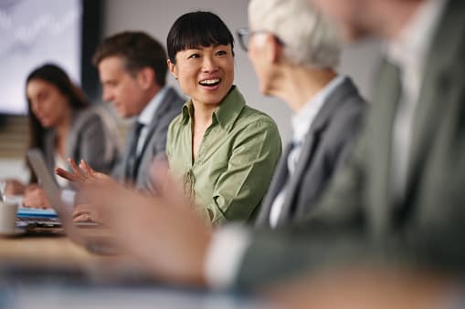 Business colleagues having a face-to-face conversation in an office